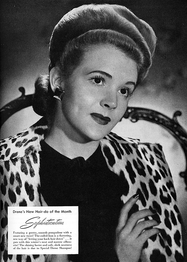 1940s wave updo hairstyle on woman wearing leopard print jacket