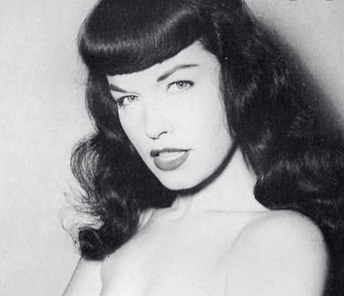 Bettie Page 1950s pinup model with bangs hairstyle