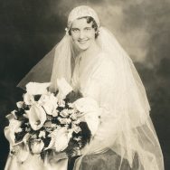 1920s-bride-wearing-juliet-cap-wedding-veil-with-fingerwaves