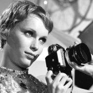 © ABACA. 57551-106. 1968. Dandy in Aspic. Mia Farrow as photographer with her Nikon camera.